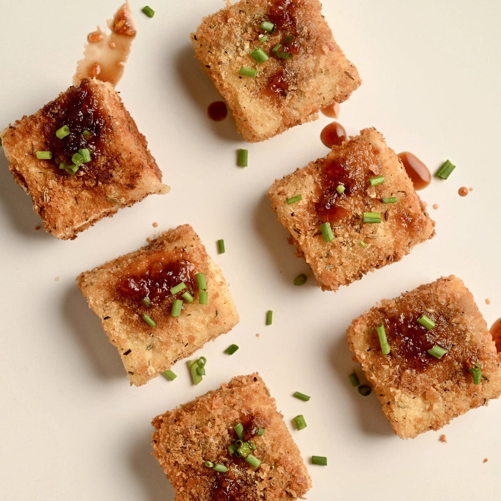 Bite sized crispy tofu topped with sage on top