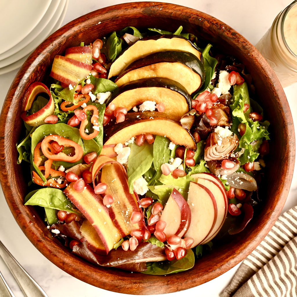 A wooden bowl filled with salad